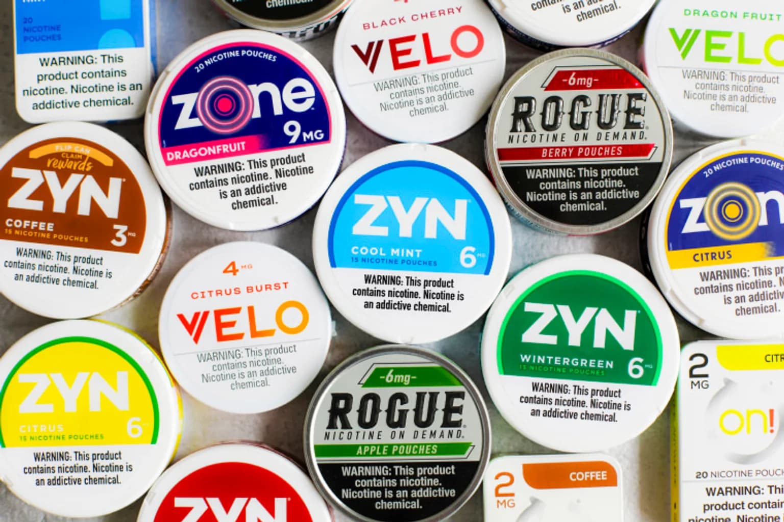 Cans of DIZZ vs Glick from the Nicotine Pouches Canada range