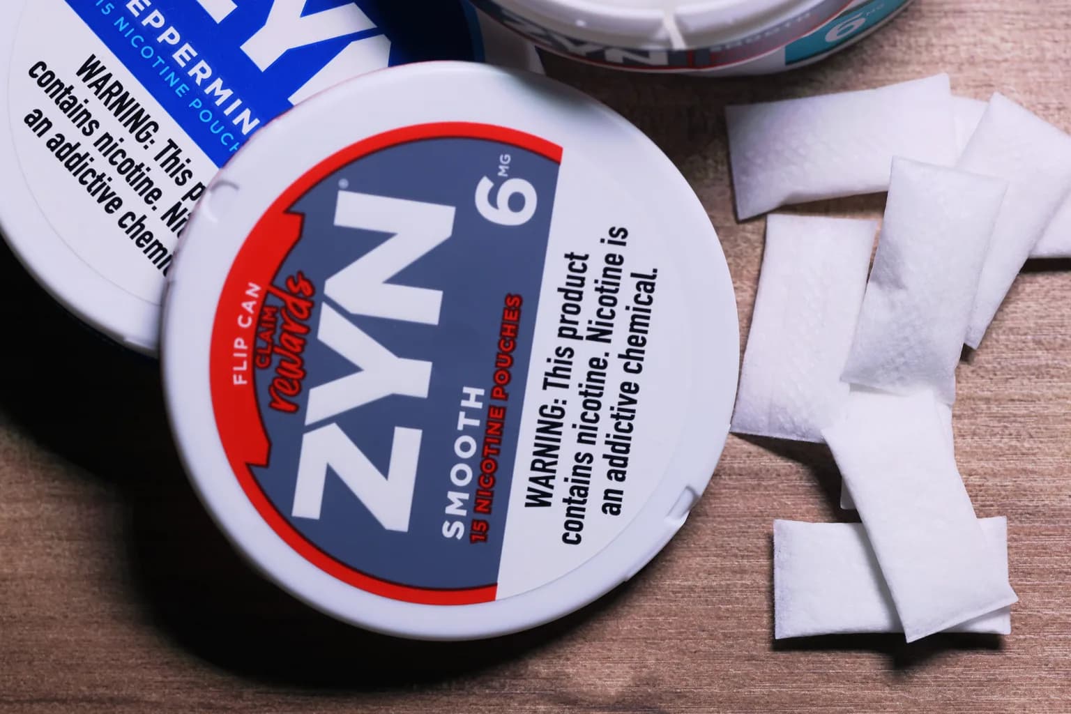 Cans of ZYN vs VELO from the Nicotine Pouches Canada range